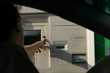 Person using drive-up ATM
